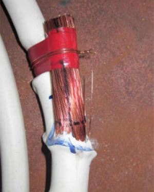 Electrical cable with external shroud melted away